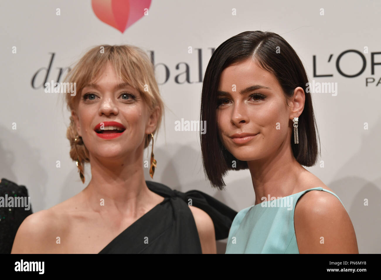 19 September 2018, Berlin: Heike Makatsch (l) and Lena Meyer-Landrut come to the charity gala 'Dreamball' at the Westhafen Event & Convention Center. Donations are collected for girls and women suffering from cancer. Photo: Jens Kalaene/dpa Stock Photo