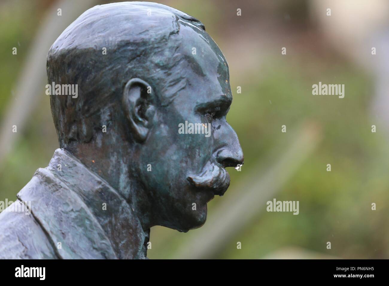 Statue of Sir Edward Elgar in wet weather, Great Malvern, UK Stock Photo