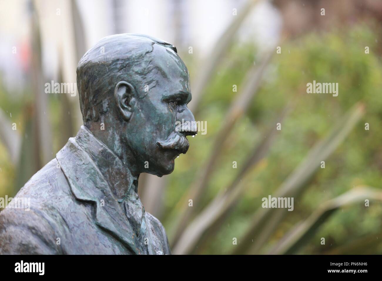 Statue of Sir Edward Elgar in wet weather, Great Malvern, UK Stock Photo