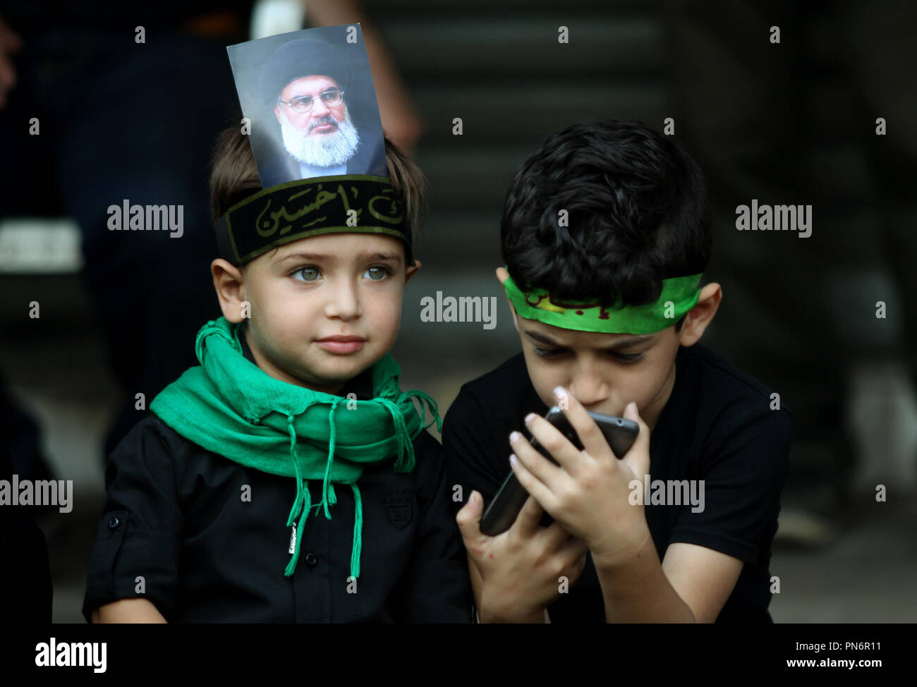 20 September 2018, Lebanon, Beirut A boy wearing a headband with the