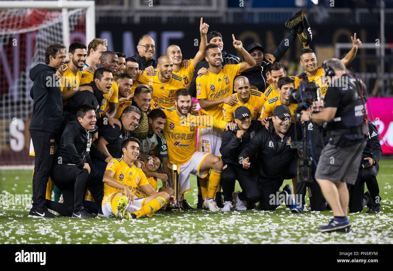 Toronto, Canada. 19th Sep, 2018. Players of Mexico's Tigres UANL celebrate victory with trophy during the awarding ceremony of the inaugural Campeones Cup match between Canada's Toronto FC and Mexico's Tigres UANL at BMO Field in Toronto, Canada, Sept. 19, 2018. Mexico's Tigres UANL won 3-1 and claimed the title. The Campeones Cup, established in 2018, is an annual North American soccer competition contested between the champions of the previous Major League Soccer season and the winner from Liga MX. Credit: Zou Zheng/Xinhua/Alamy Live News Stock Photo