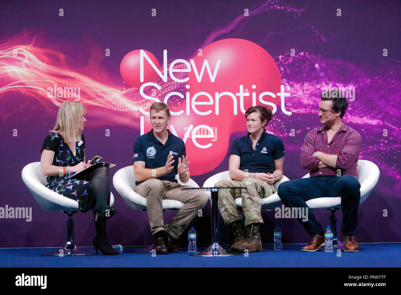 Astronaut Tim Peak and explorers Nics Wetherill and Will Millard tell  Valerie Jamieson of New Scientist Live, about life in Space and the wild corners of Earth  in a talk entitled 'To the End of the Earth and Beyond' Stock Photo