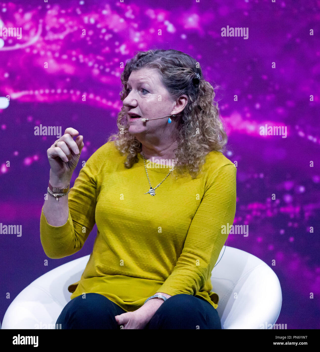 .Campaigner and film maker, Jo Ruxton, discussing ocean plastics, on the main stage at New Scientist Live News Stock Photo