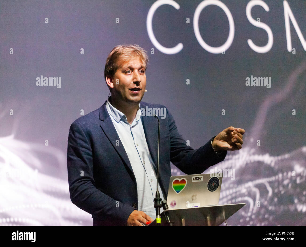 Astronomer Chris Linott  talking about the prospects of meeting life from another world, on the Cosmos Stage, at New Scientist Live Stock Photo