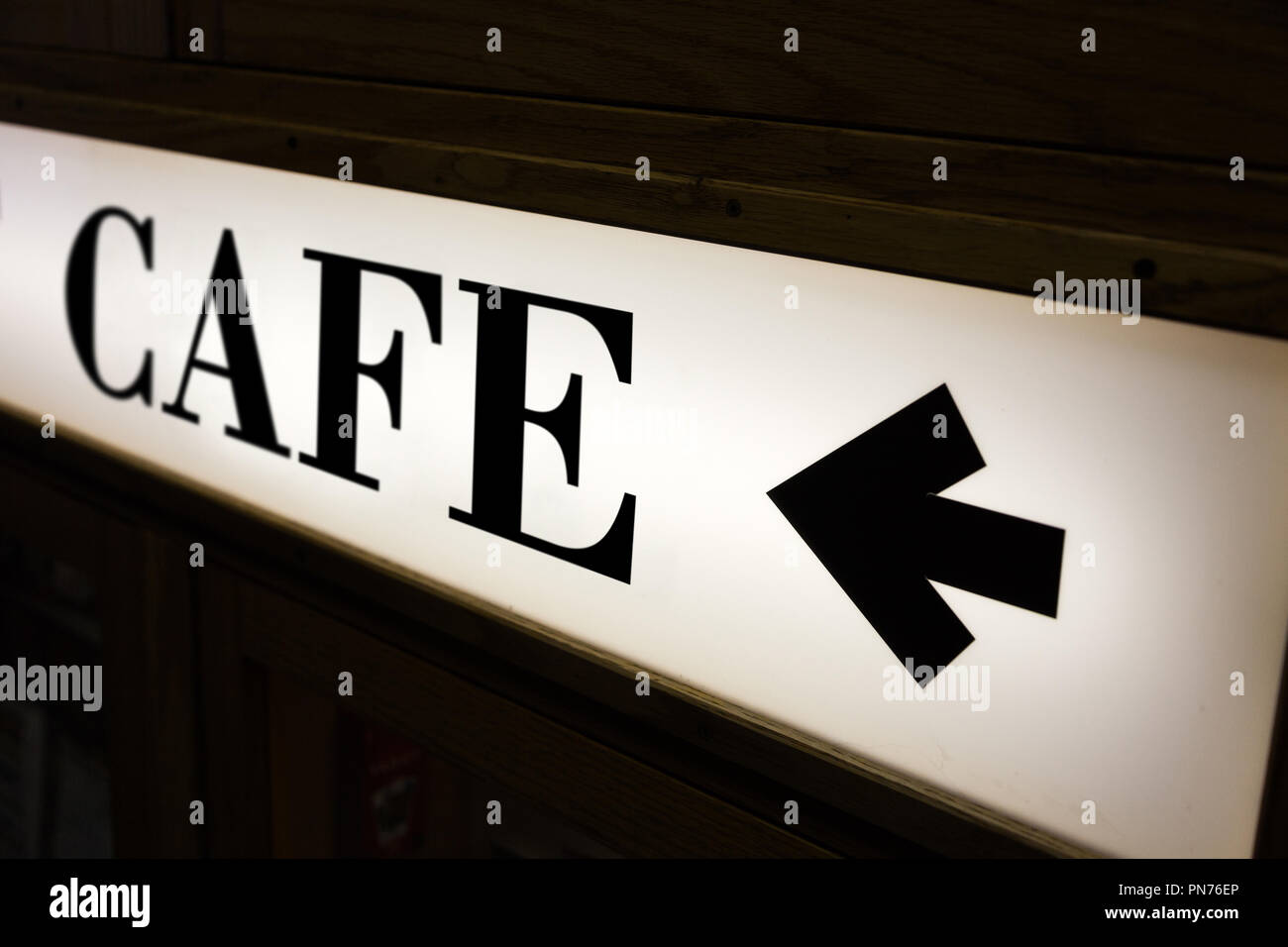sign of word cafe and direction arrow Stock Photo Alamy
