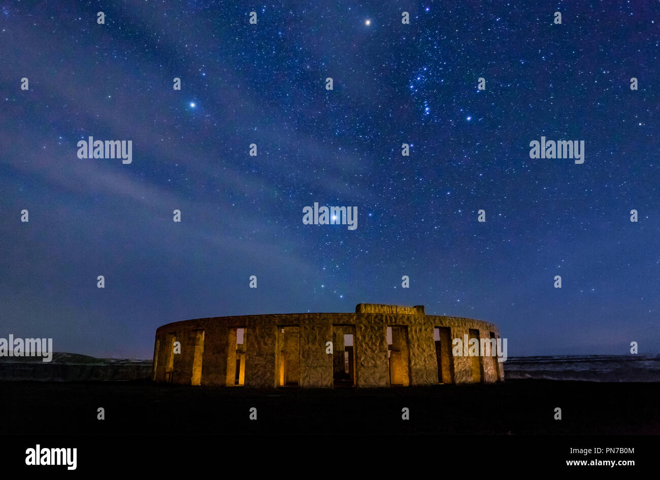 Stonehenge War Memorial at maryhill at night with stars and Orion constellation Stock Photo