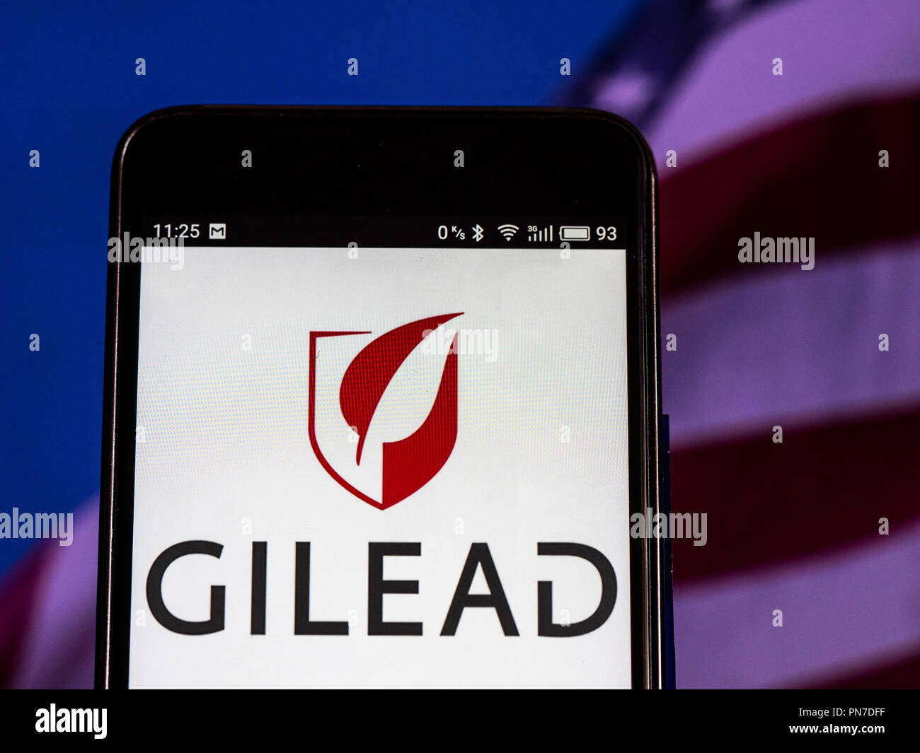 Gilead Sciences logo seen displayed on smart phone. Gilead Sciences, Inc.,  commonly known as Gilead Sciences or Gilead (also styled GILEAD), is an  American biopharmaceutical company that researches, develops and  commercializes drugs