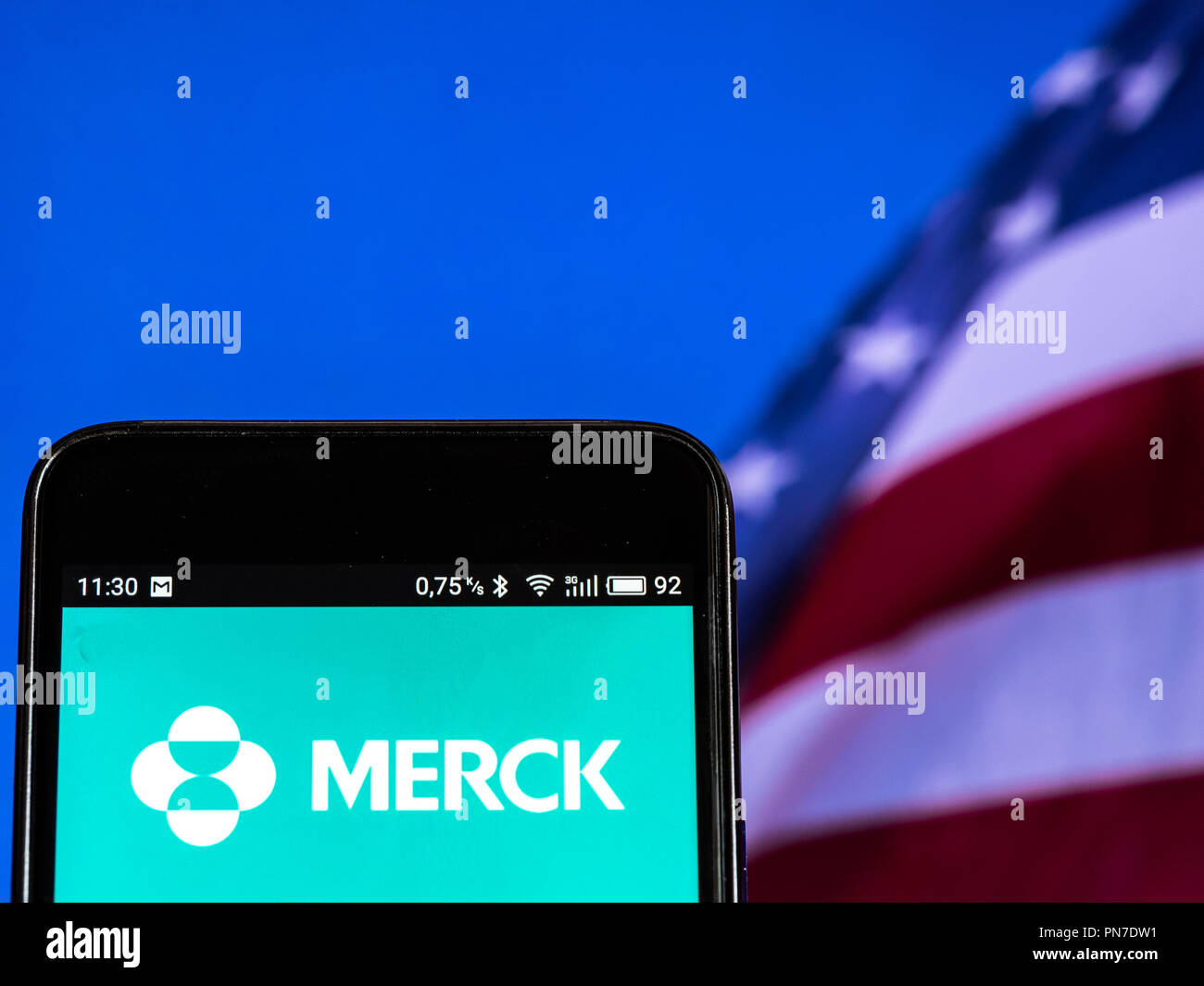 Merck & Co. logo seen displayed on smart phone. Merck & Company, Inc., d.b.a. Merck Sharp & Dohme (MSD) outside the United States and Canada, is an American pharmaceutical company and one of the largest pharmaceutical companies in the world. Stock Photo