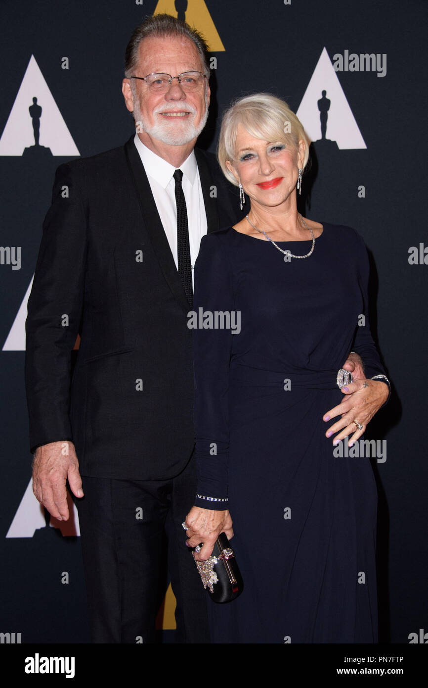 Taylor Hackford (left) and Helen Mirren attend the Academy’s 8th Annual Governors Awards in The Ray Dolby Ballroom at Hollywood & Highland Center® in Hollywood, CA, on Saturday, November 12, 2016.  File Reference # 33153 112THA  For Editorial Use Only -  All Rights Reserved Stock Photo