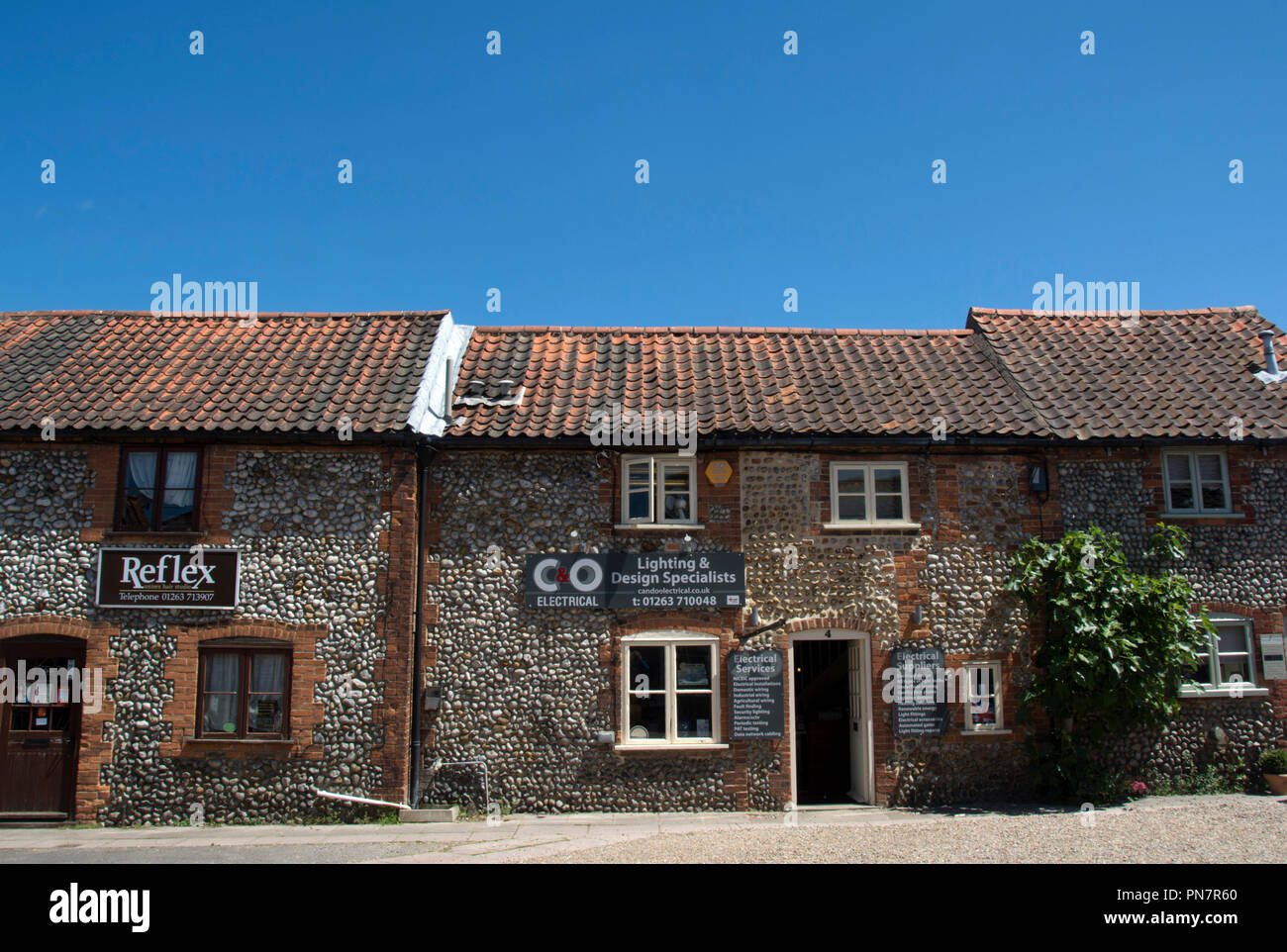 NORFOLK; HOLT; TERRACED HOUSES AND SHOPS; CHAPEL YARD Stock Photo Alamy