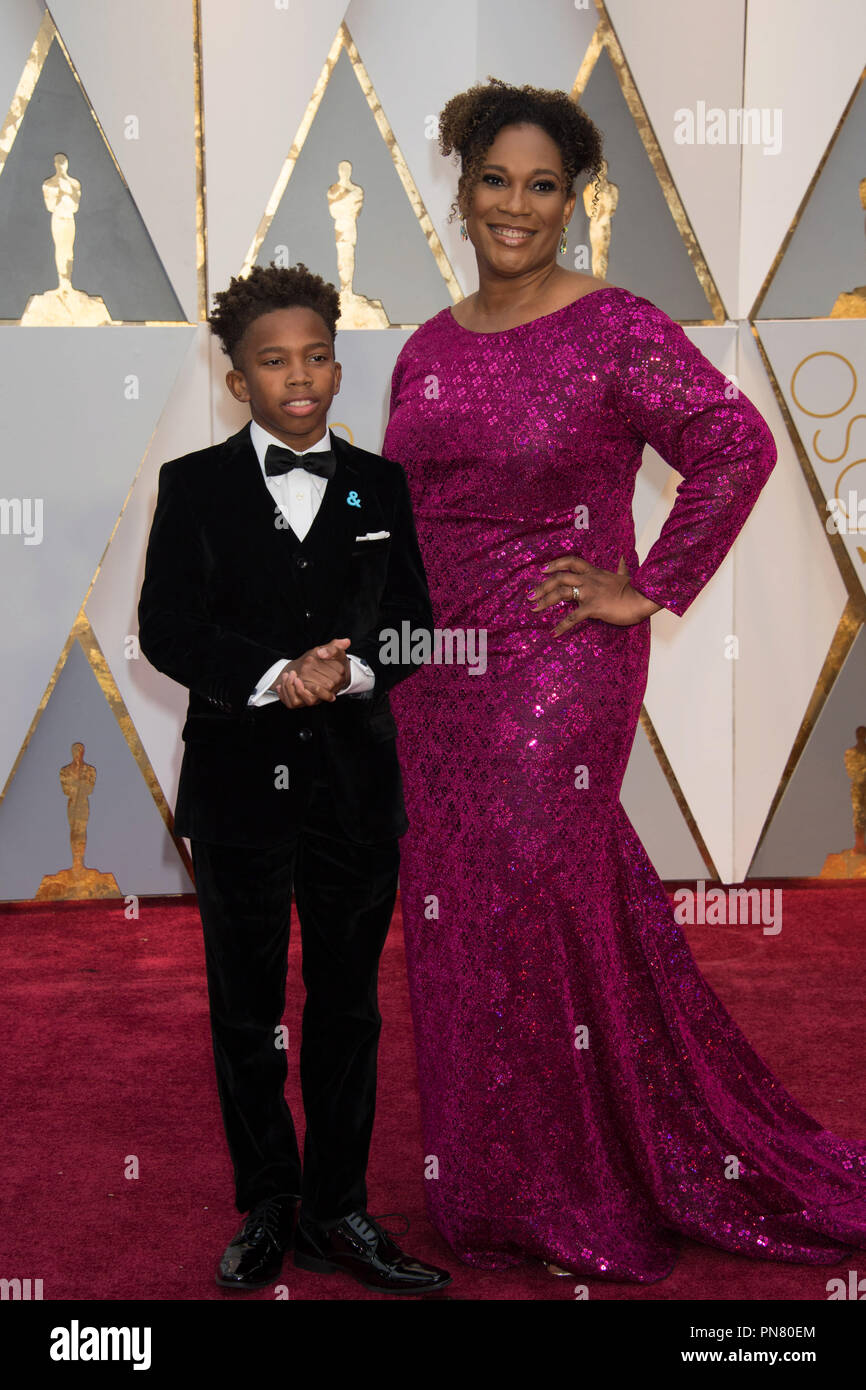 Alex R. Hibbert and guest arrive at The 89th Oscars® at the Dolby ...