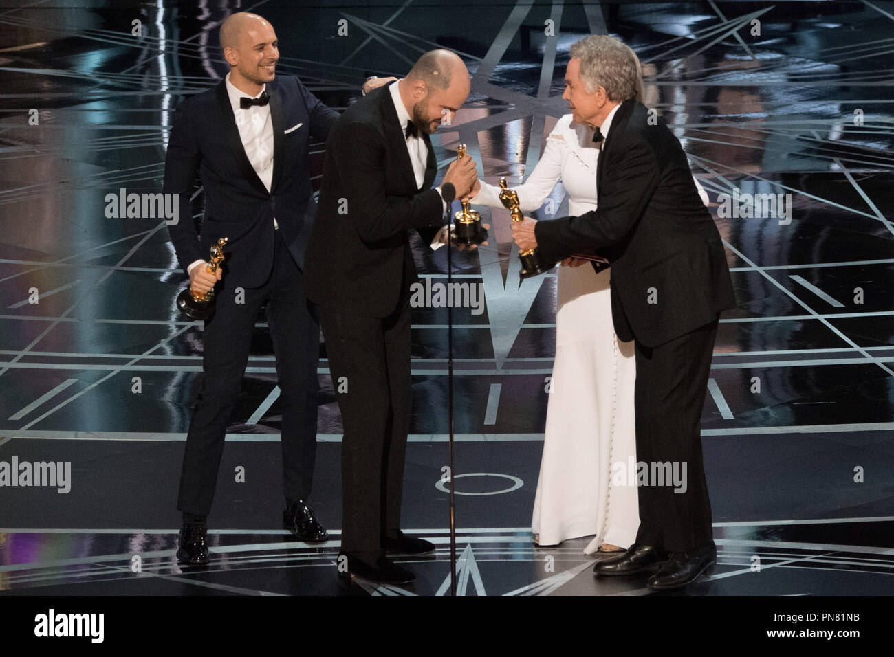 The cast of La La Land is mistakenly awarded the Oscar® for Best Picture from presenters Faye Dunaway and Warren Beatty during The 89th Oscars® at the Dolby® Theatre in Hollywood, CA on Sunday, February 26, 2017.  File Reference # 33242 484THA  For Editorial Use Only -  All Rights Reserved Stock Photo