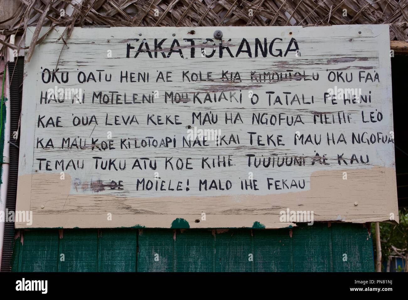 A wooden sign written in the Tongan language Stock Photo