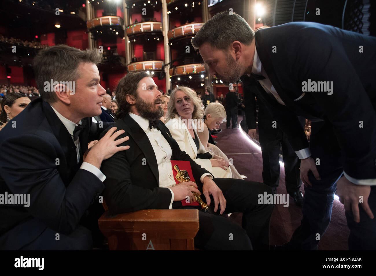 Matt Damon and Ben Affleck congratulate Casey Affleck after winning the Oscar® for Performance by an actor in a Leading role, for work on “Manchester by the Sea” during the live ABC Telecast of The 89th Oscars® at the Dolby® Theatre in Hollywood, CA on Sunday, February 26, 2017.   File Reference # 33242 654THA  For Editorial Use Only -  All Rights Reserved Stock Photo