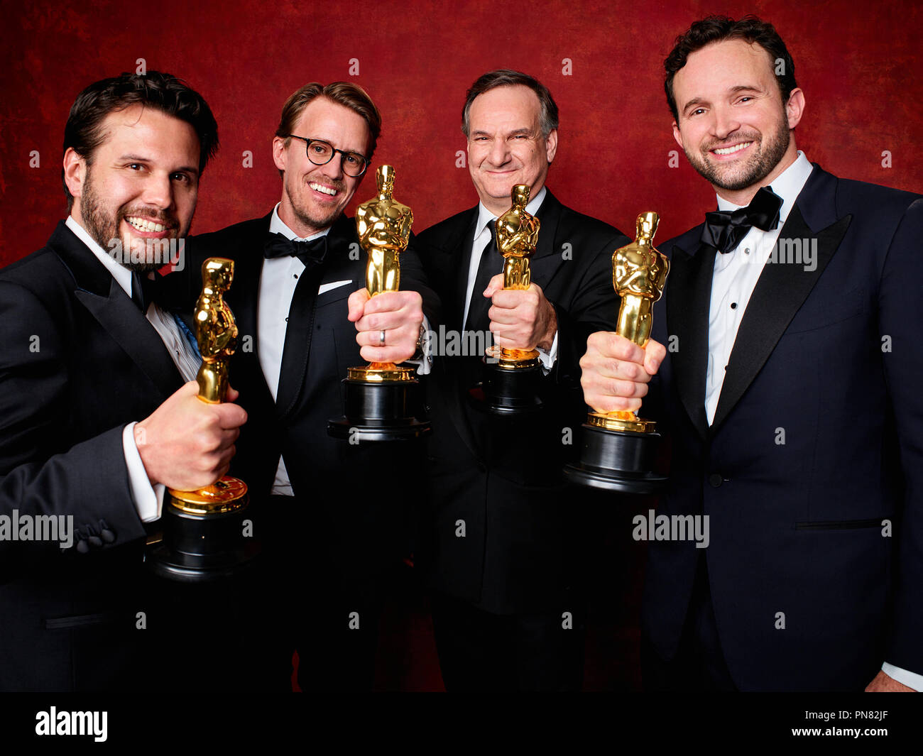 Adam Valdez, Andrew R. Jones, Robert Legato and Dan Lemmon pose backstage with the Oscar® for Achievement in visual effects, for work on “The Jungle Book” during the live ABC Telecast of The 89th Oscars® at the Dolby® Theatre in Hollywood, CA on Sunday, February 26, 2016.  File Reference # 33242_744THA  For Editorial Use Only -  All Rights Reserved Stock Photo
