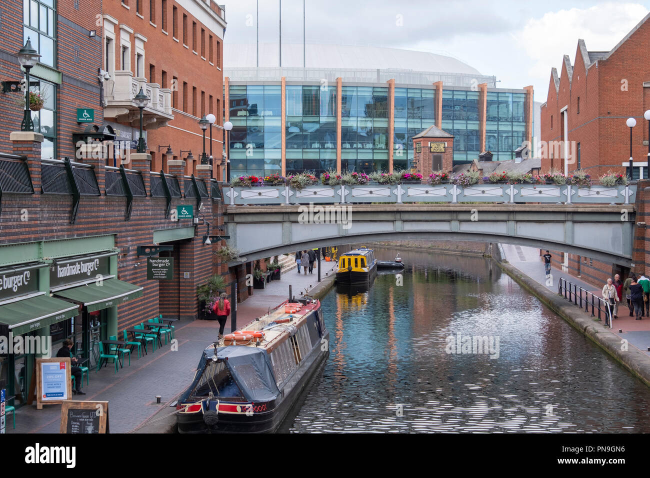 Arena Birmingham venue and the Canals at Brindleyplace, Birmingham, England Stock Photo