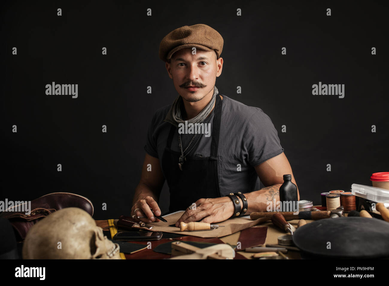 Professional shoemaker in his making and repairing custom made shoes Stock Photo Alamy