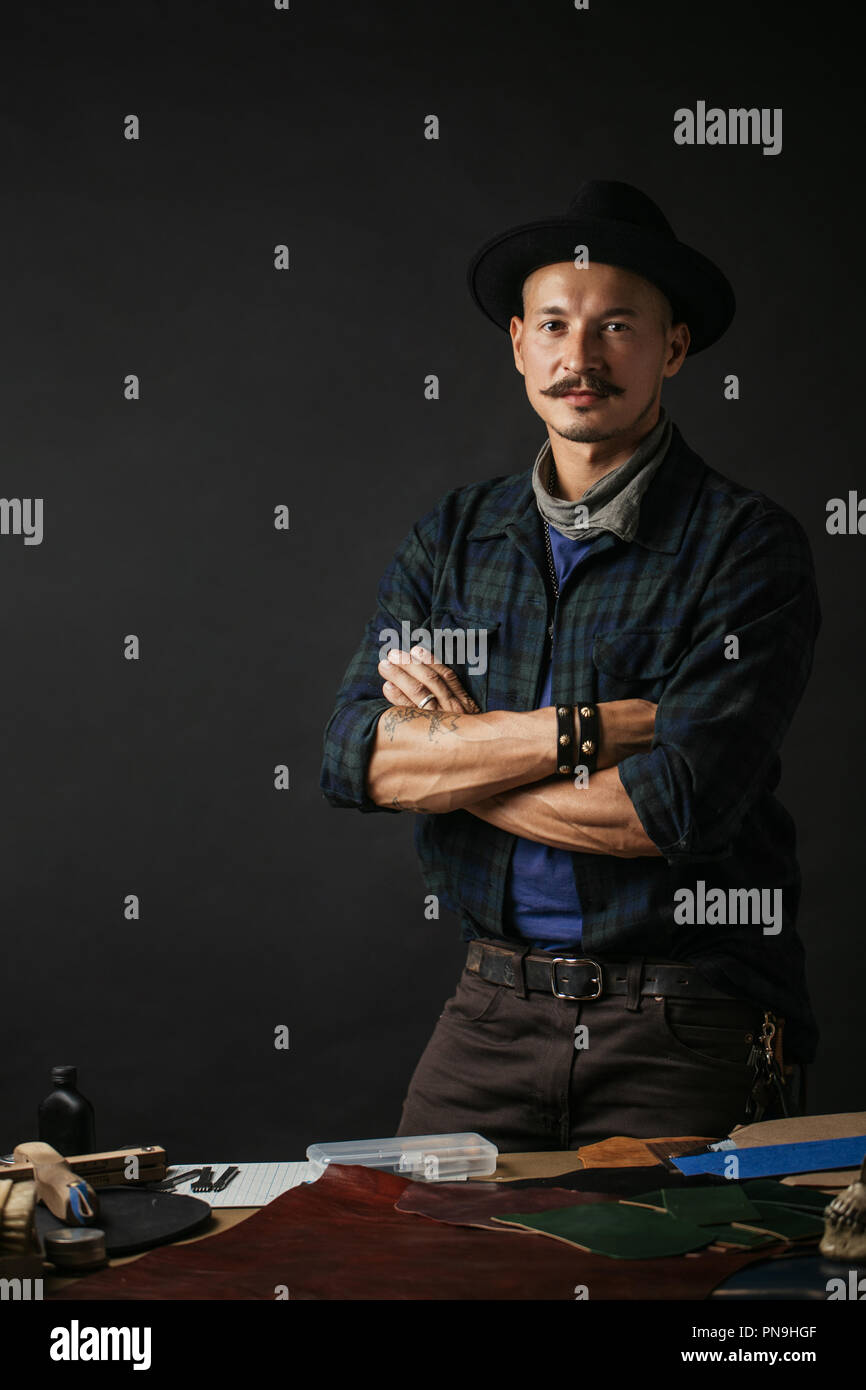 Professional shoemaker in his making and repairing custom made