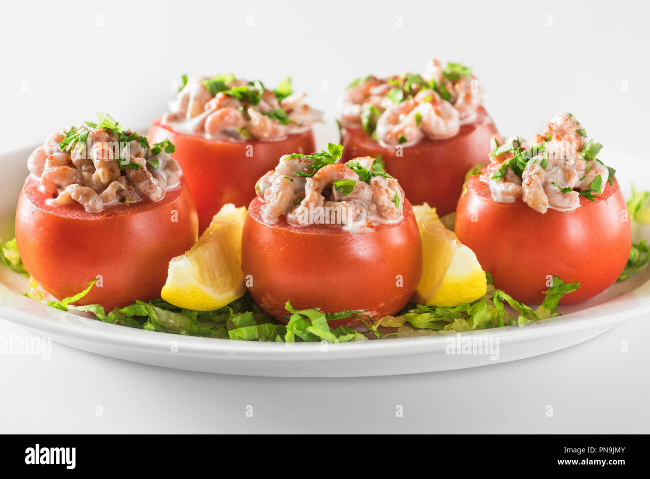 Tomates aux crevettes. Tomatoes filled with prawns. Belgium Food Stock Photo