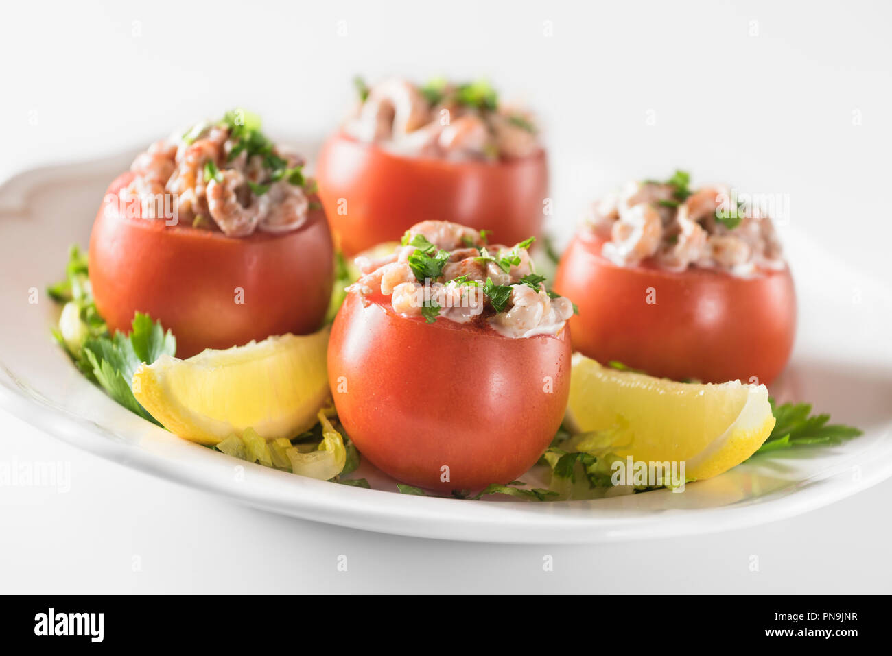 Tomates aux crevettes. Tomatoes filled with prawns. Belgium Food Stock Photo
