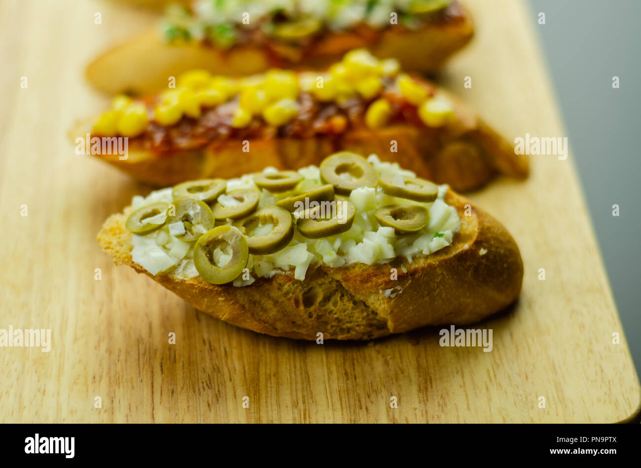 traditional spanish tapas for lunch table, mini sandwiches food set