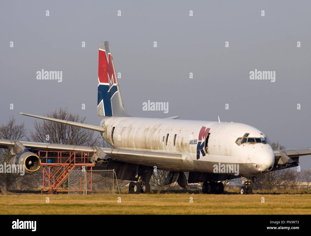 Former MK Airlines Douglas DC-8-55F(JT) in the process of being dismantled at Manston airport in Kent. Stock Photo