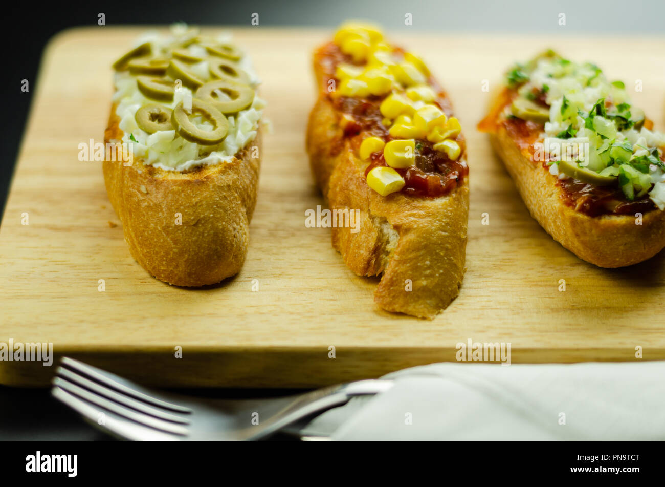 traditional spanish tapas for lunch table, mini sandwiches food set