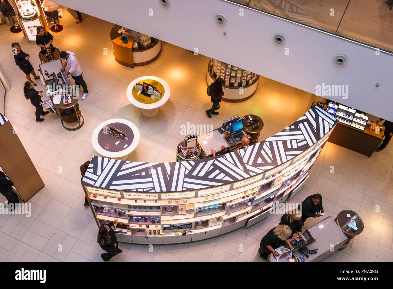Displays of luxury goods and perfumes viewed from above in the iconic flagship Oxford Street John Lewis & Partners retail department store, London W1 Stock Photo