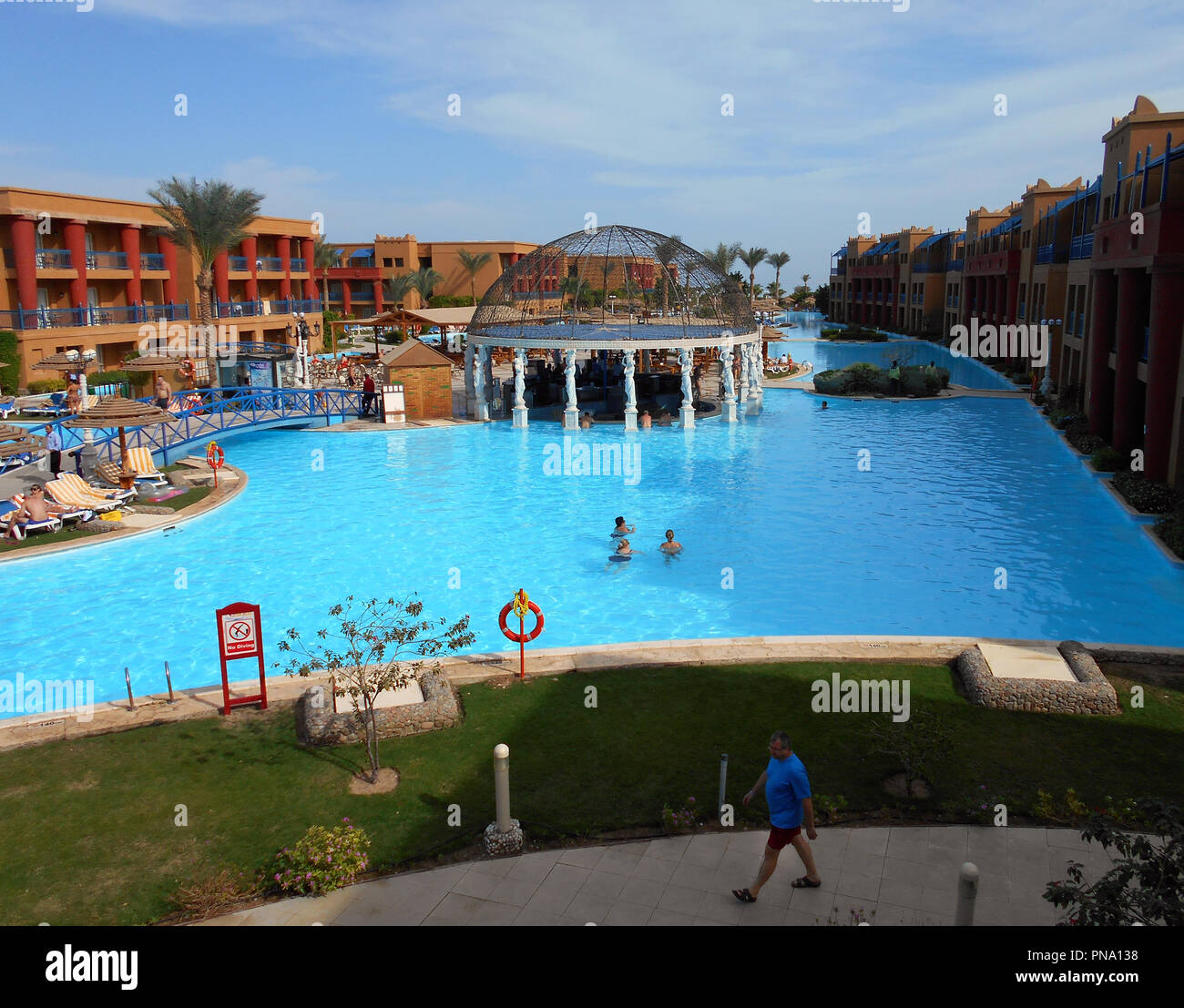 One of the huge swimming pool facilities at an hotel on the Red Sea holiday resort of Hurghada in Egypt. Stock Photo