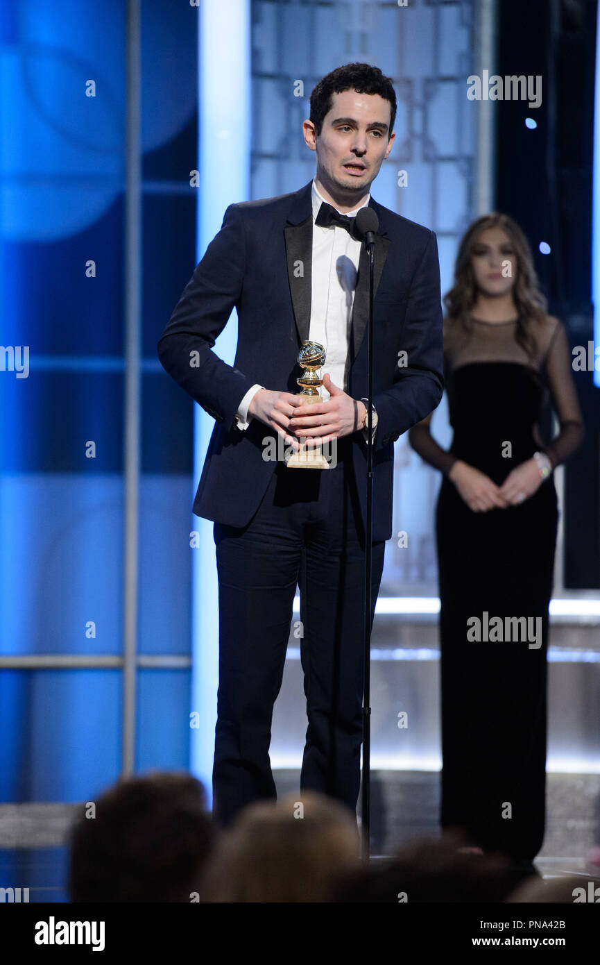 The Golden Globe is awarded to Damien Chazelle for BEST SCREENPLAY – MOTION PICTURE for 'La La Land' at the 74th Annual Golden Globe Awards at the Beverly Hotel in Beverly Hills, CA on Sunday, January 8, 2017.  File Reference # 33198 903JRC  For Editorial Use Only -  All Rights Reserved Stock Photo