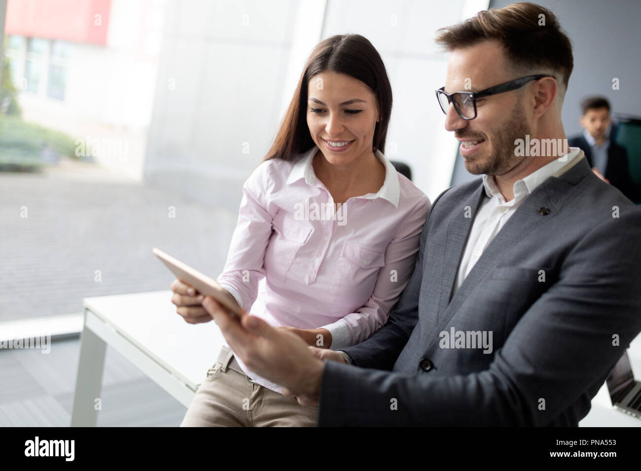 Business colleagues in conference meeting room during presentation Stock Photo