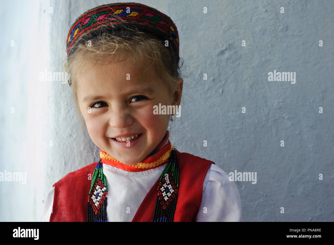 Traditionally dressed girl from the Wakhan valley ( Pamir region, Tajikistan) Stock Photo