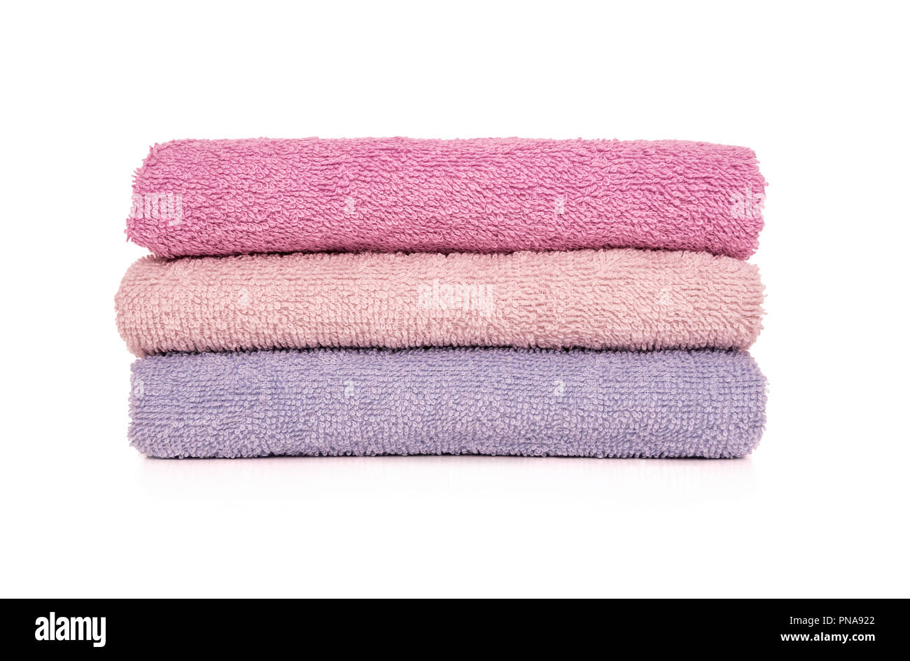 Terry towels. They are stacked vertically on top of each other. Stock Photo