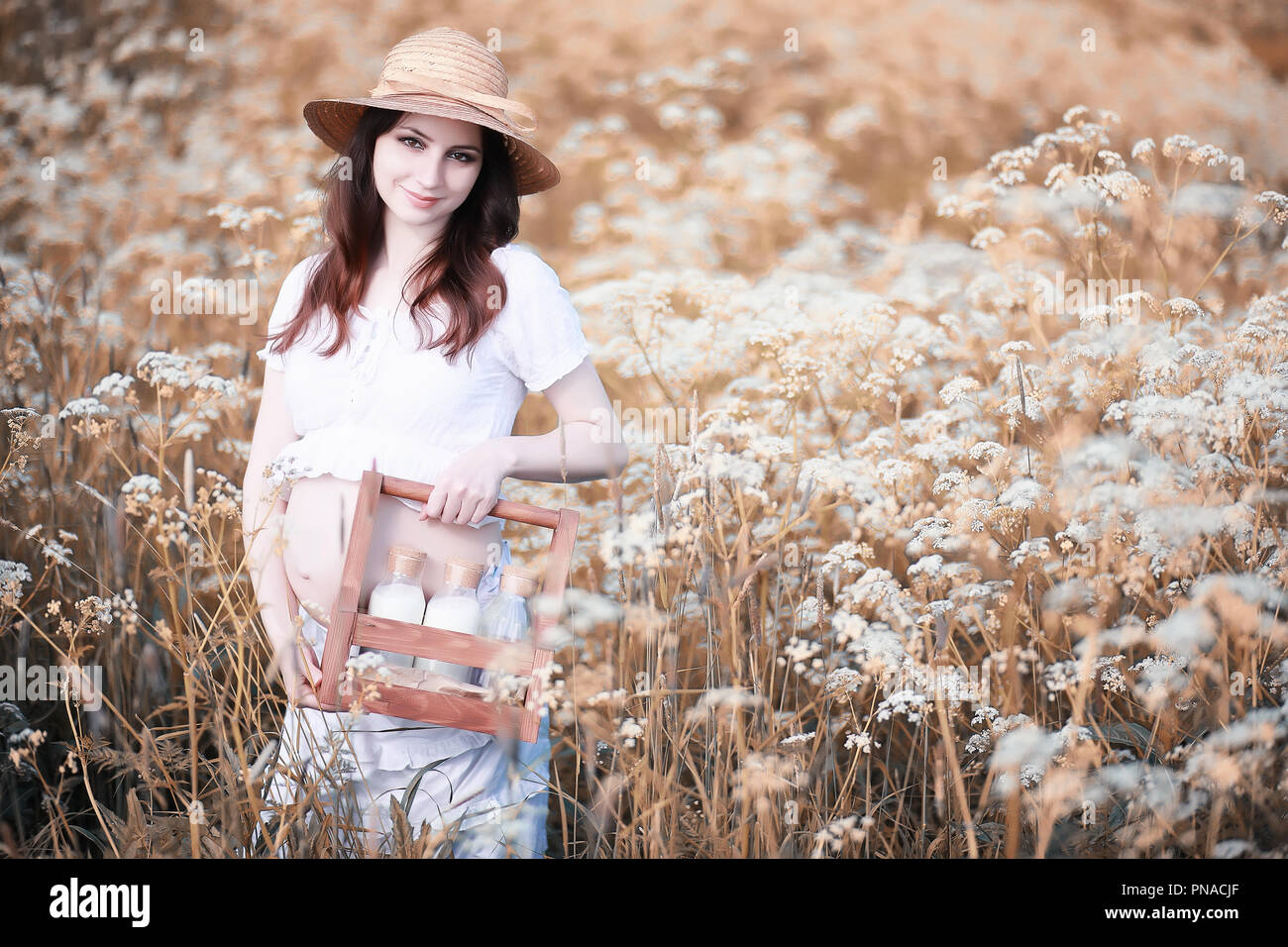 Pregnant woman in nature for a walk in the autumn Stock Photo - Alamy