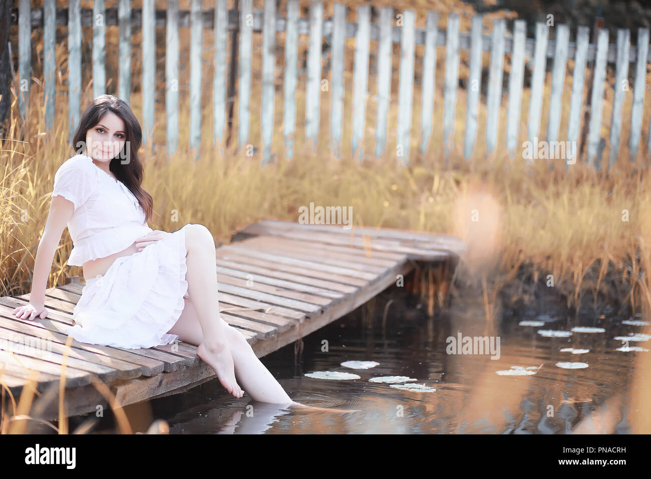 Pregnant woman in nature for a walk in the autumn Stock Photo - Alamy