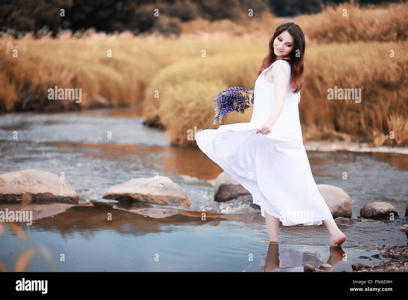 Pregnant woman in nature for a walk in the autumn Stock Photo - Alamy