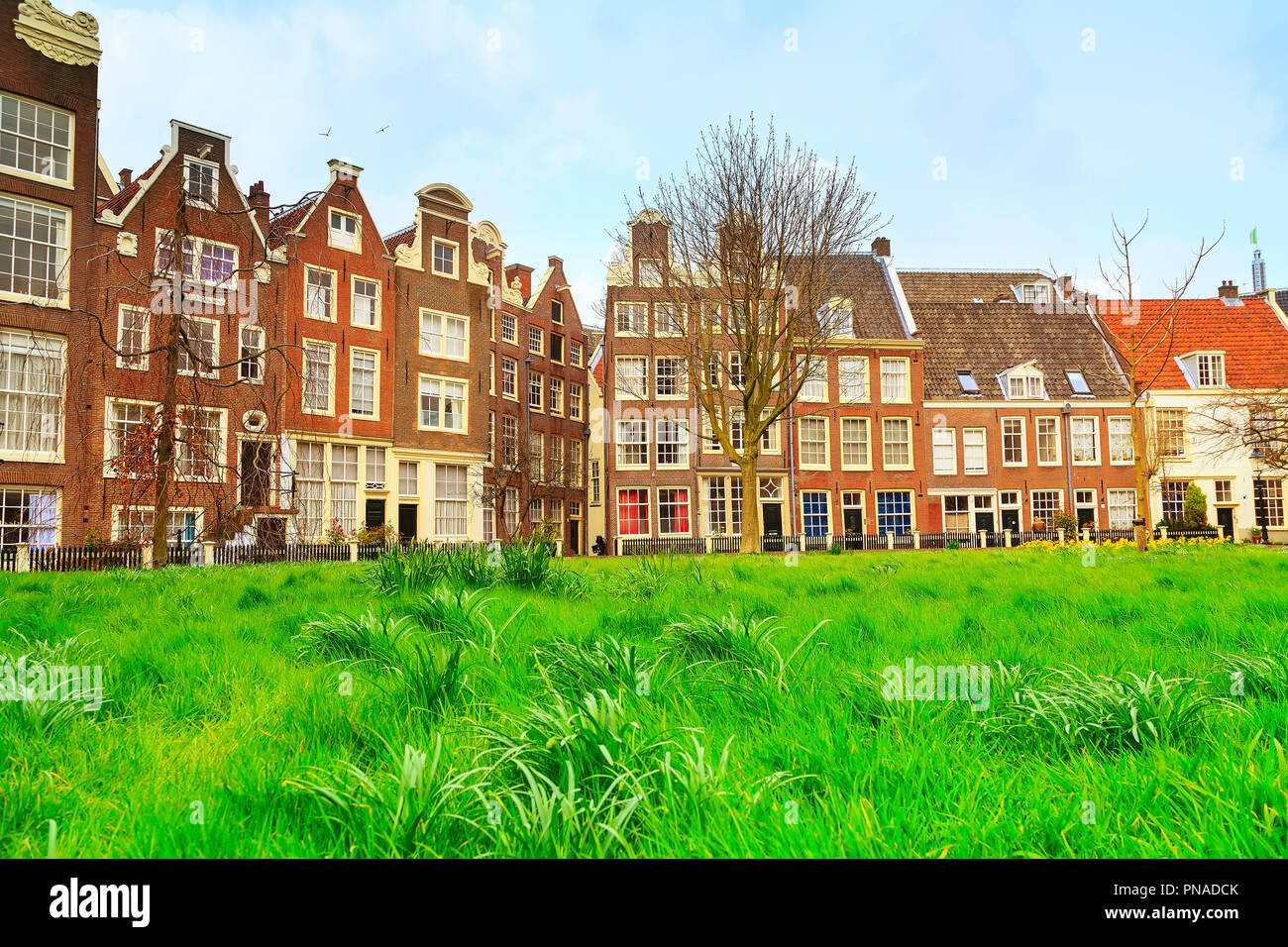 Begijnhof courtyard with dutch houses in Amsterdam, Netherlands Stock