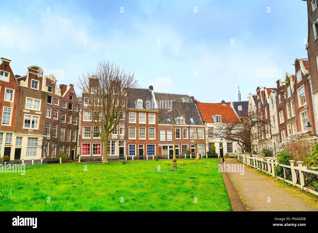 Begijnhof courtyard with dutch houses in Amsterdam, Netherlands Stock