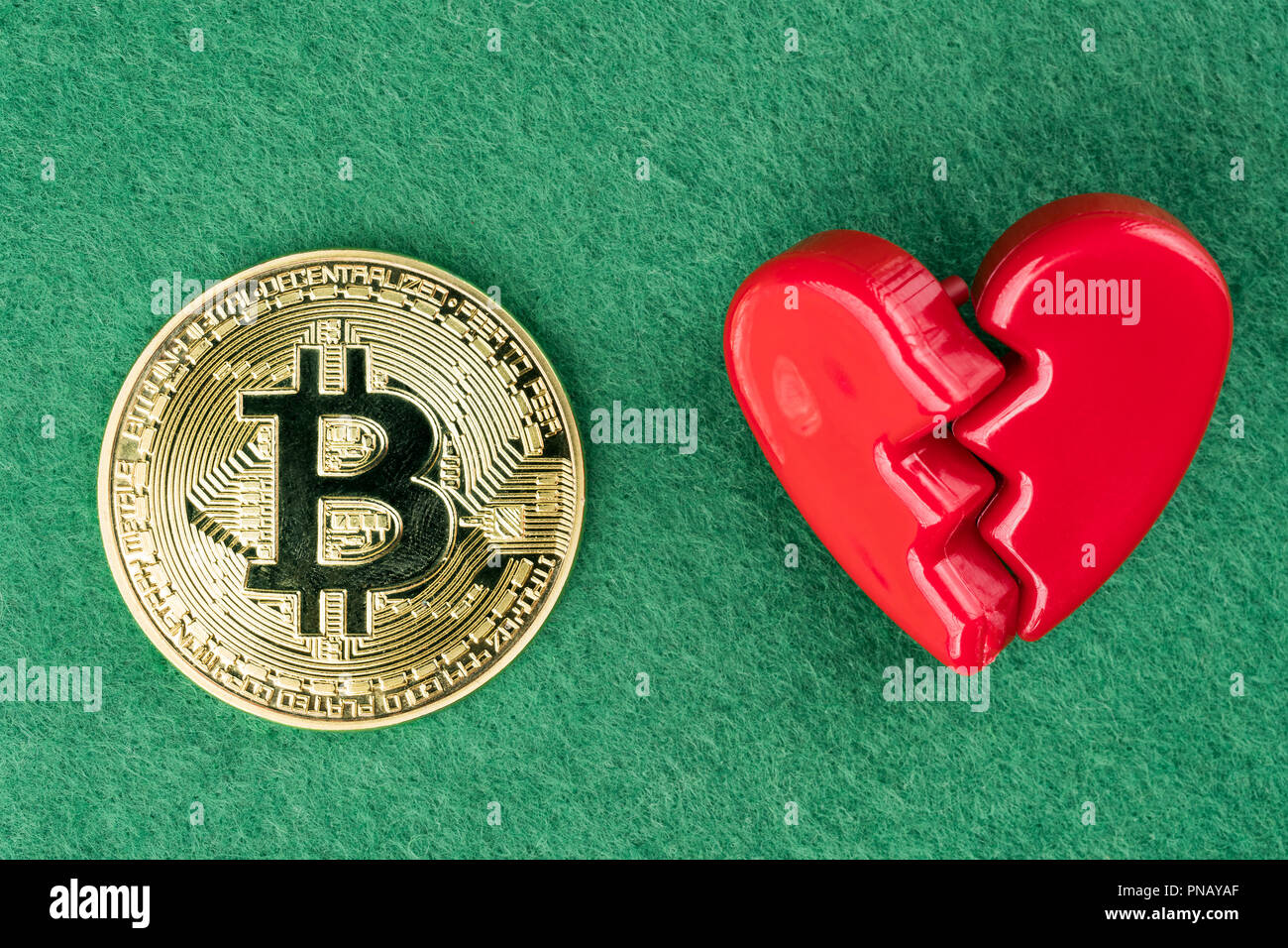 Gold physical Bitcoin coin with broken heart on green background. Crypto  currency market break or no love abstract concept. Flat lay top view Stock  Photo - Alamy