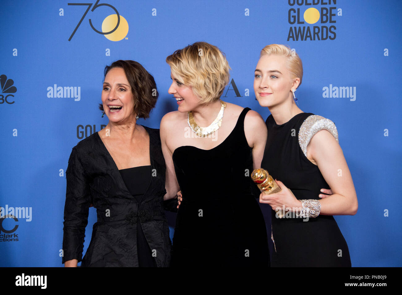 For BEST MOTION PICTURE – COMEDY OR MUSICAL, the Golden Globe is awarded to 'Lady Bird,' directed by Greta Gerwig. Laurie Metcalf, Greta Gerwig and Saoirse Ronan pose with the award backstage in the press room at the 75th Annual Golden Globe Awards at the Beverly Hilton in Beverly Hills, CA on Sunday, January 7, 2018. Stock Photo