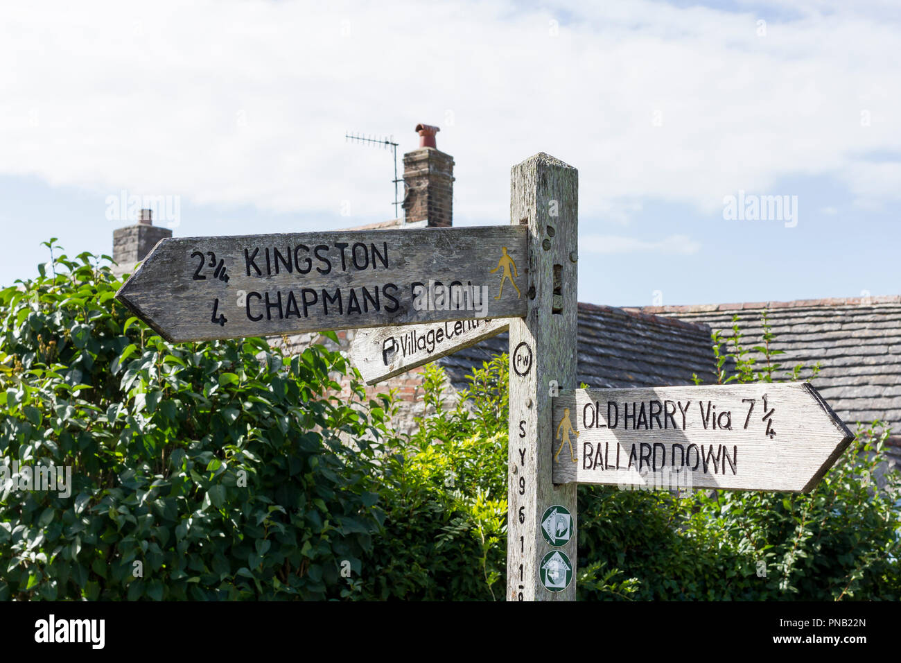 Signpost at Corfe Castle village for Kingson, Chapmans Pool, Old Harry, Ballard Down, Dorset, UK Stock Photo