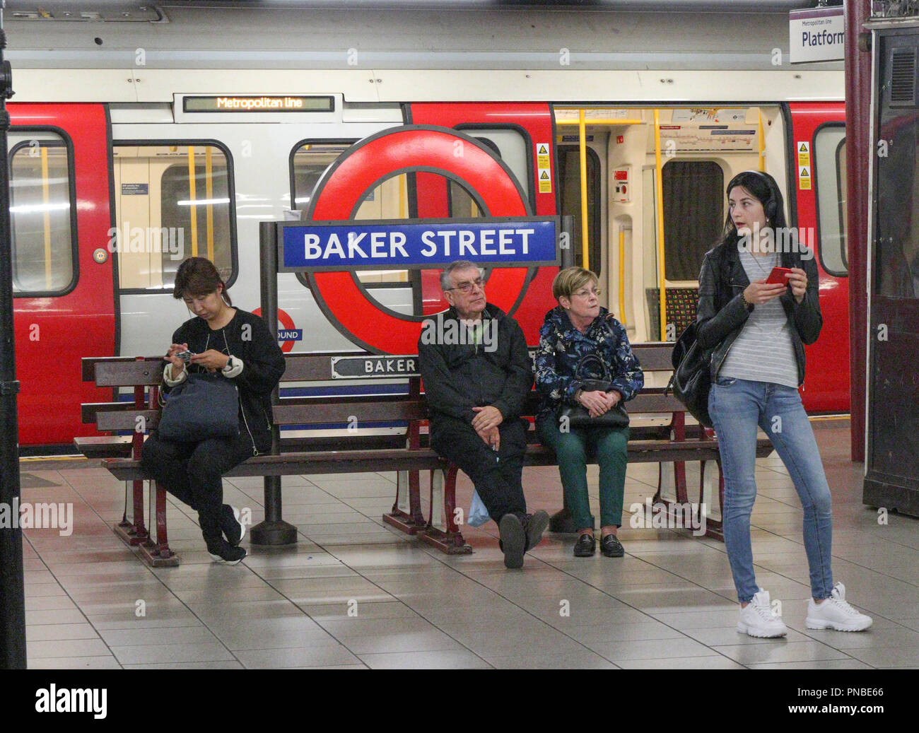 passengers waiting for train, London Underground, England, UK Stock Photo
