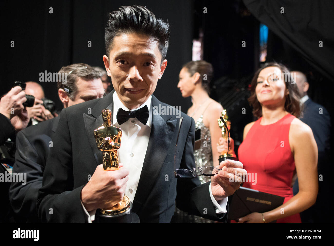 Kazuhiro Tsuji poses backstage with the Oscar® for Achievement in makeup, for work on “Darkest Hour” during the live ABC Telecast of The 90th Oscars® at the Dolby® Theatre in Hollywood, CA on Sunday, March 4, 2018.  File Reference # 33546 434PLX  For Editorial Use Only -  All Rights Reserved Stock Photo