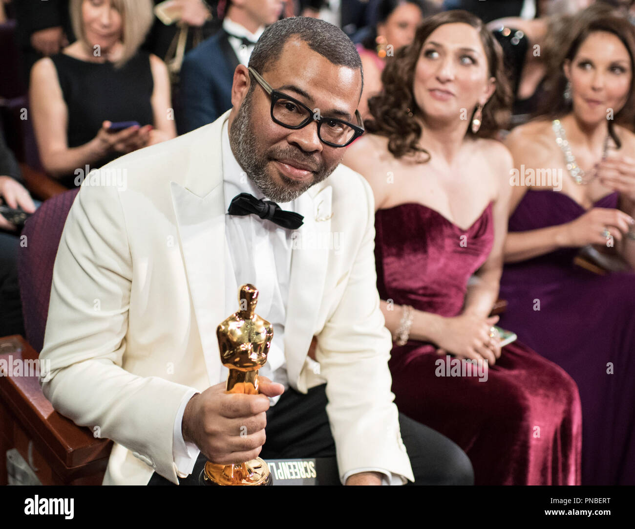 Oscar® winner for Original Screenplay, Jordan Peele, Chelsea Peretti and Ashley Judd at the 90th Oscars® at the Dolby® Theatre in Hollywood, CA on Sunday, March 4, 2018.  File Reference # 33546 566PLX  For Editorial Use Only -  All Rights Reserved Stock Photo