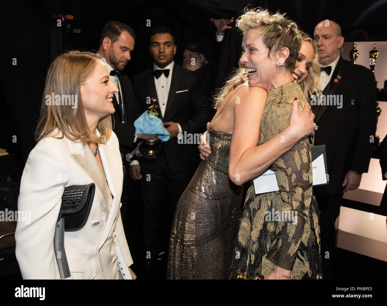 Jodi Foster and Jennifer Lawrence congratulate Frances McDormand backstage after presenting McDormand with the Oscar® for performance by an actress in a leading role for her work on “Three Billboards Outside Ebbing, Missouri” during the live ABC Telecast of The 90th Oscars® at the Dolby® Theatre in Hollywood, CA on Sunday, March 4, 2018.  File Reference # 33546 745PLX  For Editorial Use Only -  All Rights Reserved Stock Photo