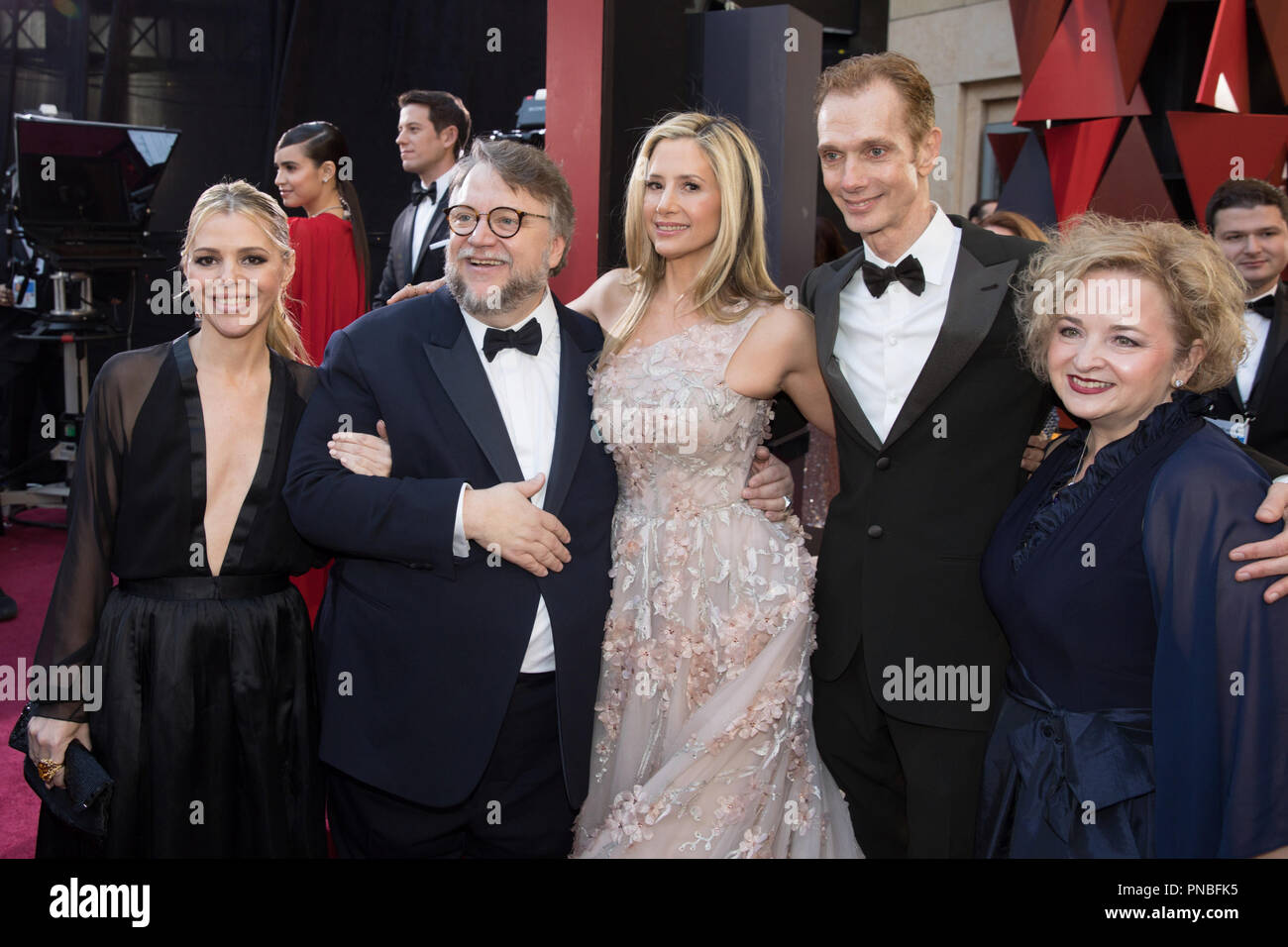 (Left to Right) Guest, Oscar® nominee Guillermo del Toro, Mira Sorvino, Doug Jones and guest arrive on the red carpet of The 90th Oscars® at the Dolby® Theatre in Hollywood, CA on Sunday, March 4, 2018.  File Reference # 33546 799PLX  For Editorial Use Only -  All Rights Reserved Stock Photo