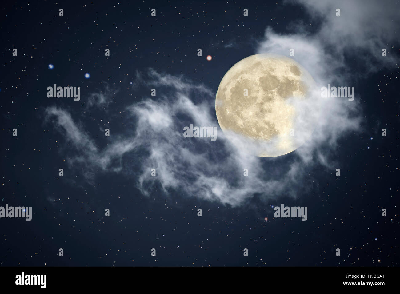 Full moon night sky with stars and clouds Stock Photo