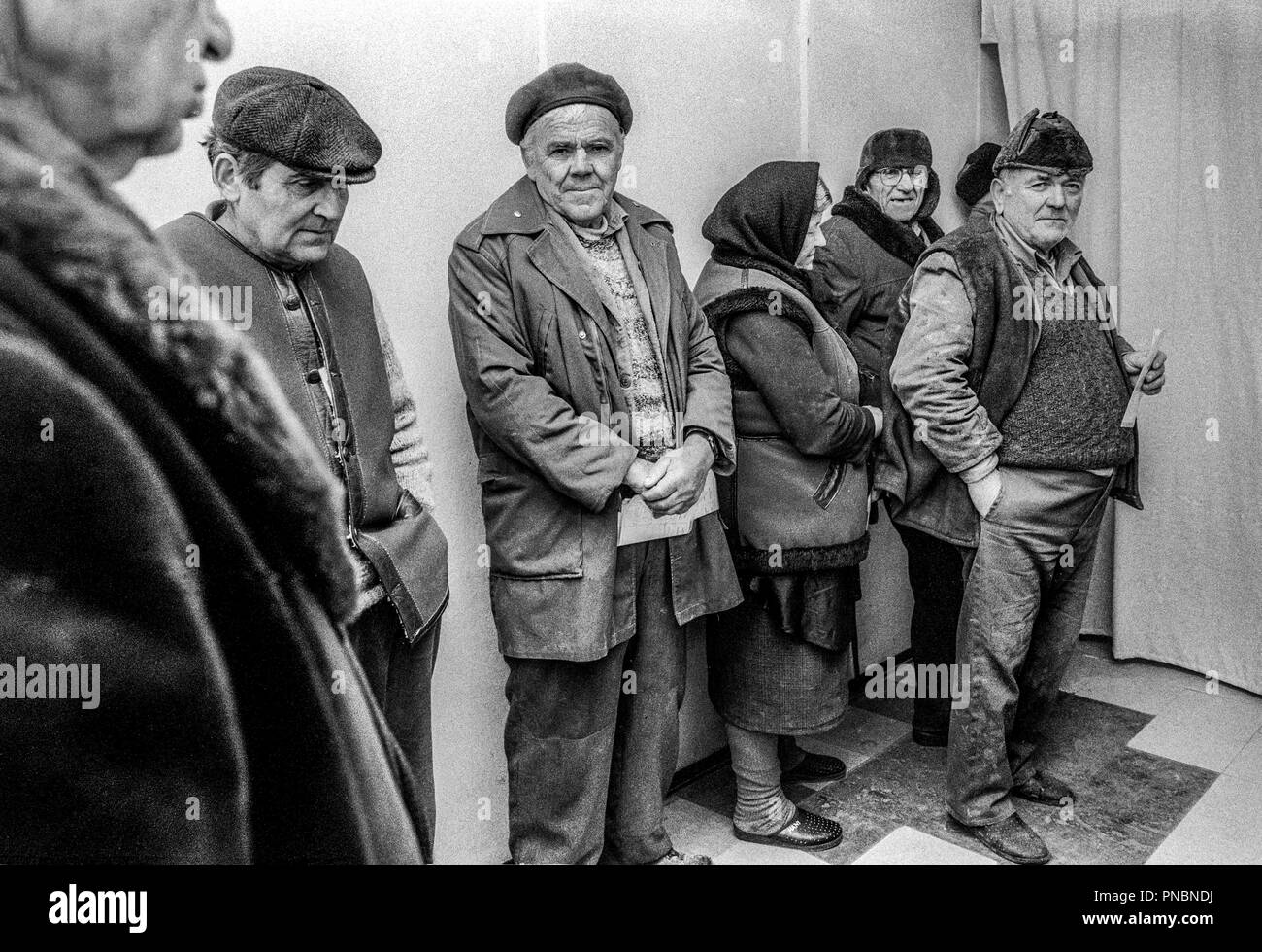 An MSF mobile team at a make shift doctors surgery in Ostrovo, Croatia. MSF provided curative health care to elderly and vulnerable populations in 12 remote villages in the region until March 1998.The patients were mainly elderly Serbs. Waiting  to see the nurses and doctors. Stock Photo