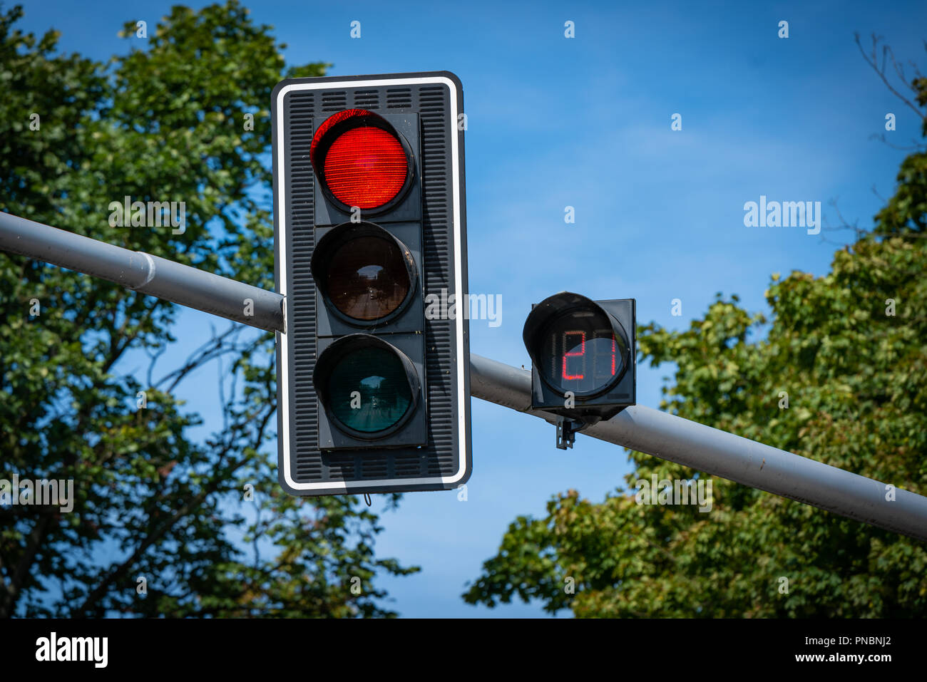red color on the traffic light with count down - The number counts down ...