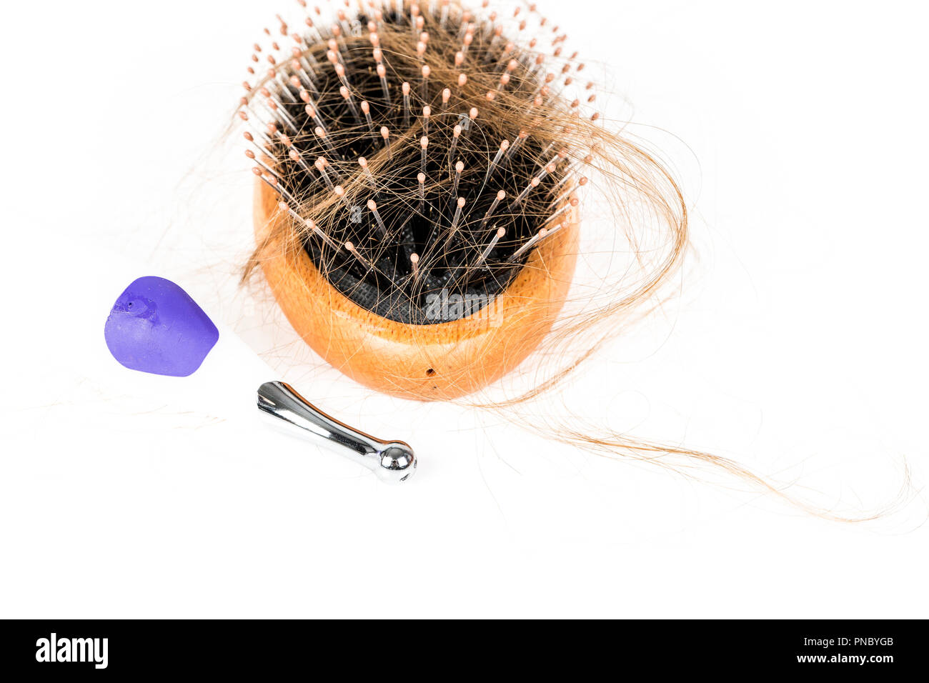 Wood Hairbrush On White Background Close Up With Long Brown Hair